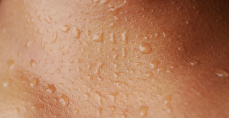 image showing a fine hypochlorous acid spray mist on skin