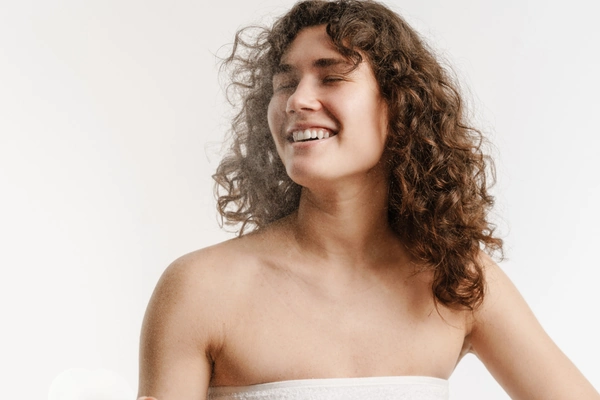 Image showing a women with fresh clear skin after using hypochlorous acid spray